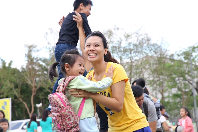 A parent and child doing math activities together